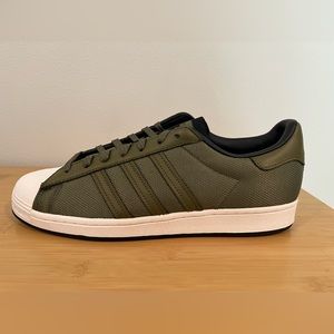 Adidas Superstar.  Olive Focus/ core black